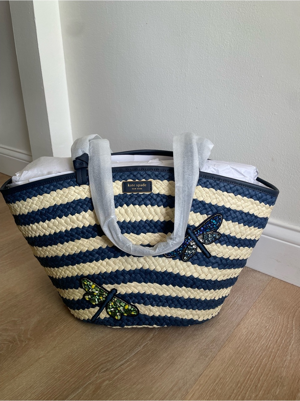 kate spade navy and cream striped straw tote with jeweled dragonfly accents